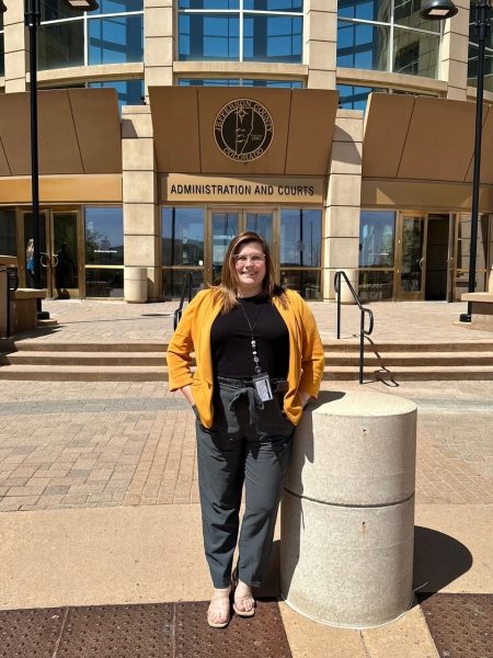 Allison Clark standing outside the Administration and Courts building in Jefferson County.